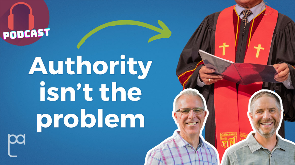 Authority isn’t the problem. Scott and Shawn in front of a church clergyman in his robes